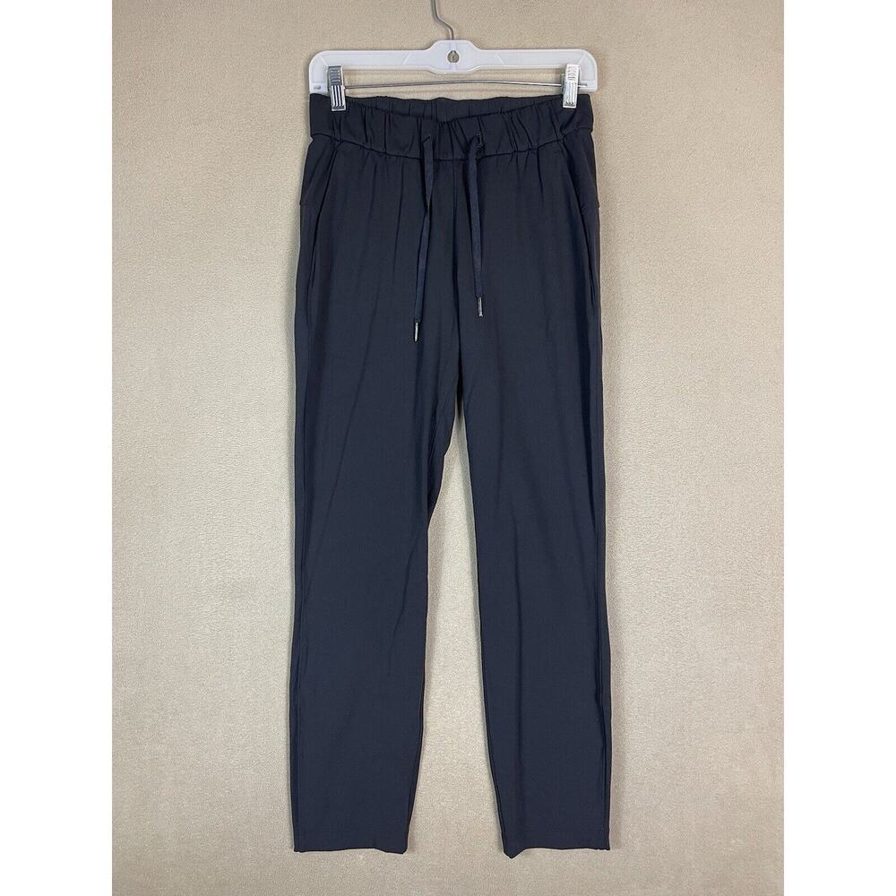 Lululemon On The Fly‎ Pant Womens 4 Black Elastic Waist Pocket Drawstring Logo